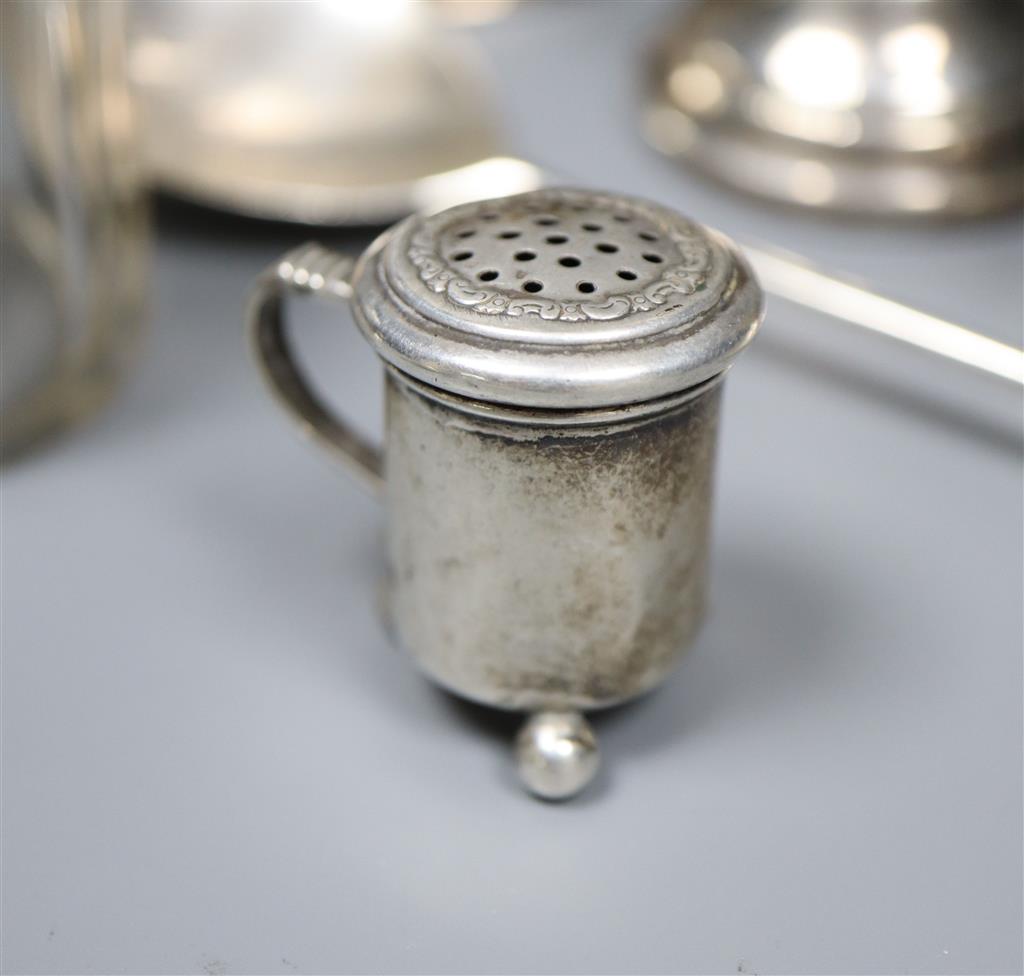 A silver Christening mug, a pair of silver seal top spoons and sundry silver,